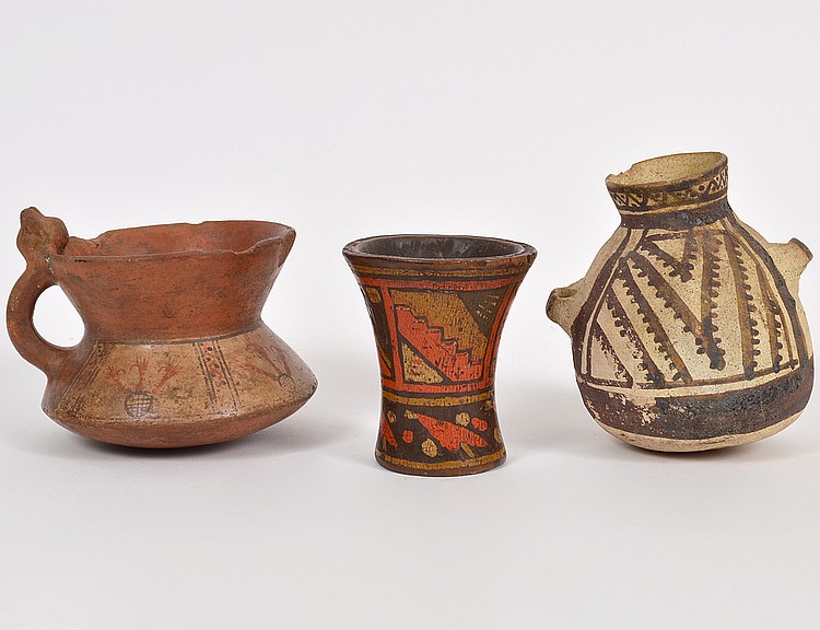 Appraisal: THREE PRE-COLUMBIAN CERAMIC VESSELSComprising a brown decorated cream ground clay