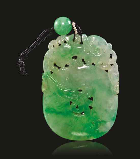 Appraisal: A Jadeite Pendant of apple green and near transparent stone