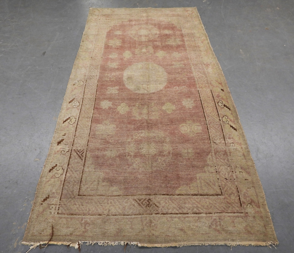 Appraisal: ANTIQUE KHOTAN RUG Turkey Circa Tan brown white and pink