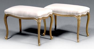 Appraisal: Pair gilt wood footstools each with molded skirt and cabriole