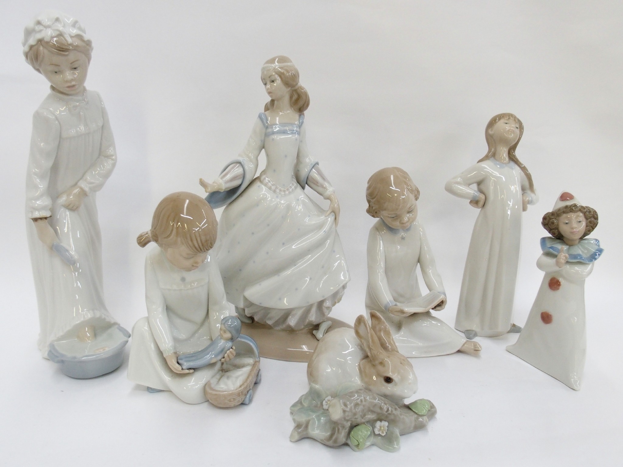 Appraisal: Group of four Lladro figures and four Nao figures