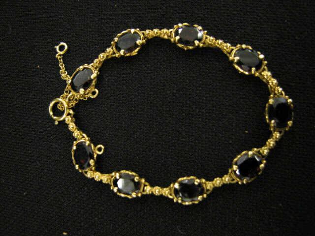 Appraisal: Garnet Bracelet oval gems totaling approx carats in k yellow