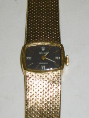 Appraisal: A LADY'S CT GOLD ROLEX PRECISION WATCH the winding movement