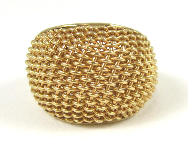 Appraisal: FOURTEEN KARAT YELLOW GOLD DESIGNER RING having a yellow gold