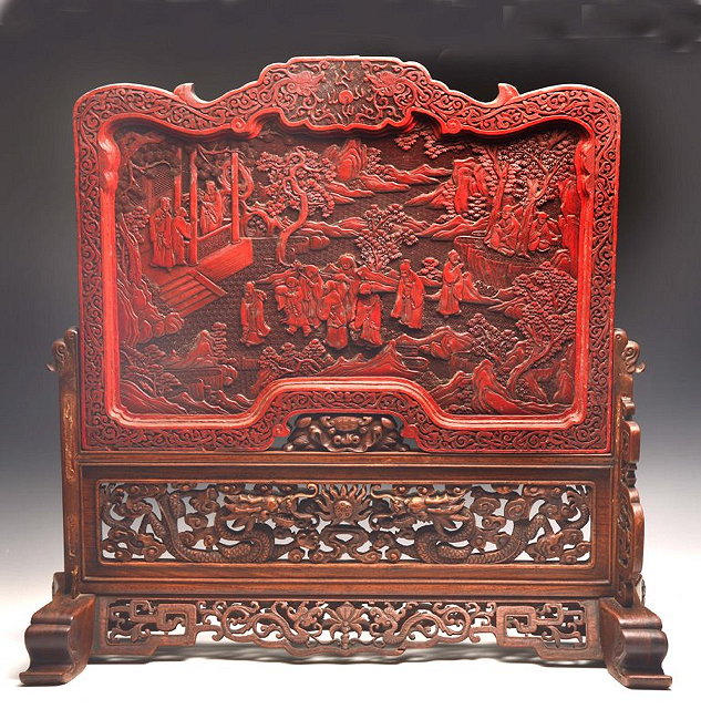 Appraisal: A CHINESE CARVED RED CINNABAR LACQUER TI HUNG TABLE SCREEN