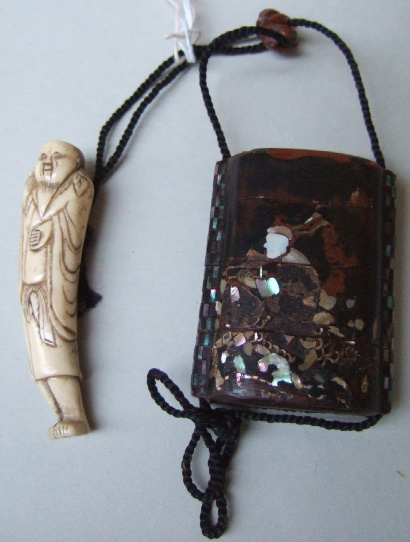 Appraisal: A four-case lacquer inro inlaid in mother-of-pearl with a figure