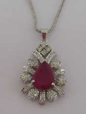 Appraisal: A rubellite and diamond pendant the central pear shaped stone