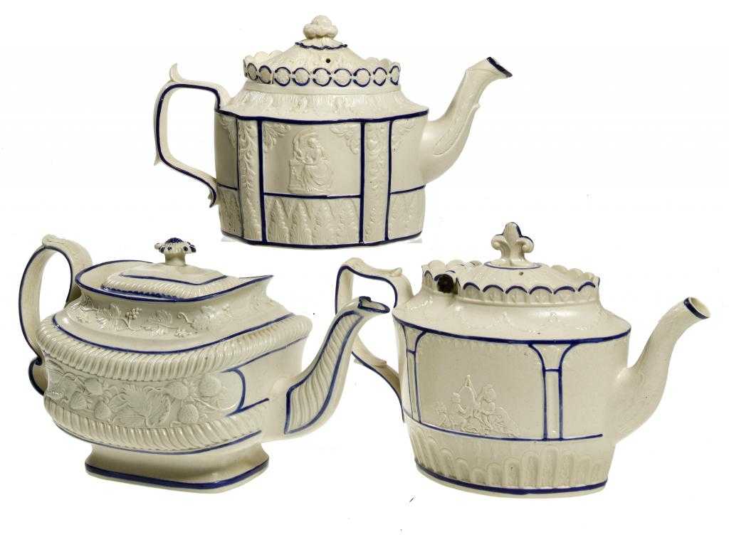 Appraisal: THREE WHITE FELSPATHIC STONEWARE TEAPOTS AND COVERS YORKSHIRE OR STAFFORDSHIRE