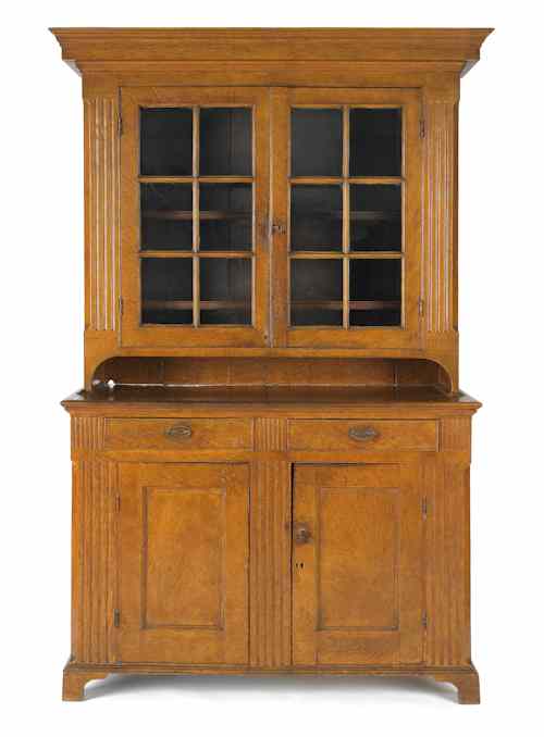 Appraisal: Pennsylvania painted walnut two-part Dutch cupboard ca retaining an old