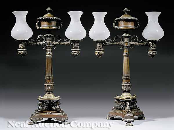 Appraisal: A Monumental Pair of French Patinated and Gilt Bronze Two-Light