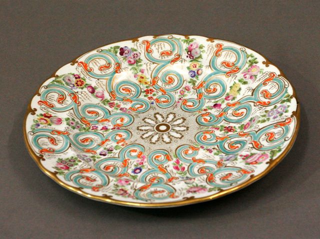 Appraisal: A pearlware cabinet plate with radiating ribboned and floral pattern