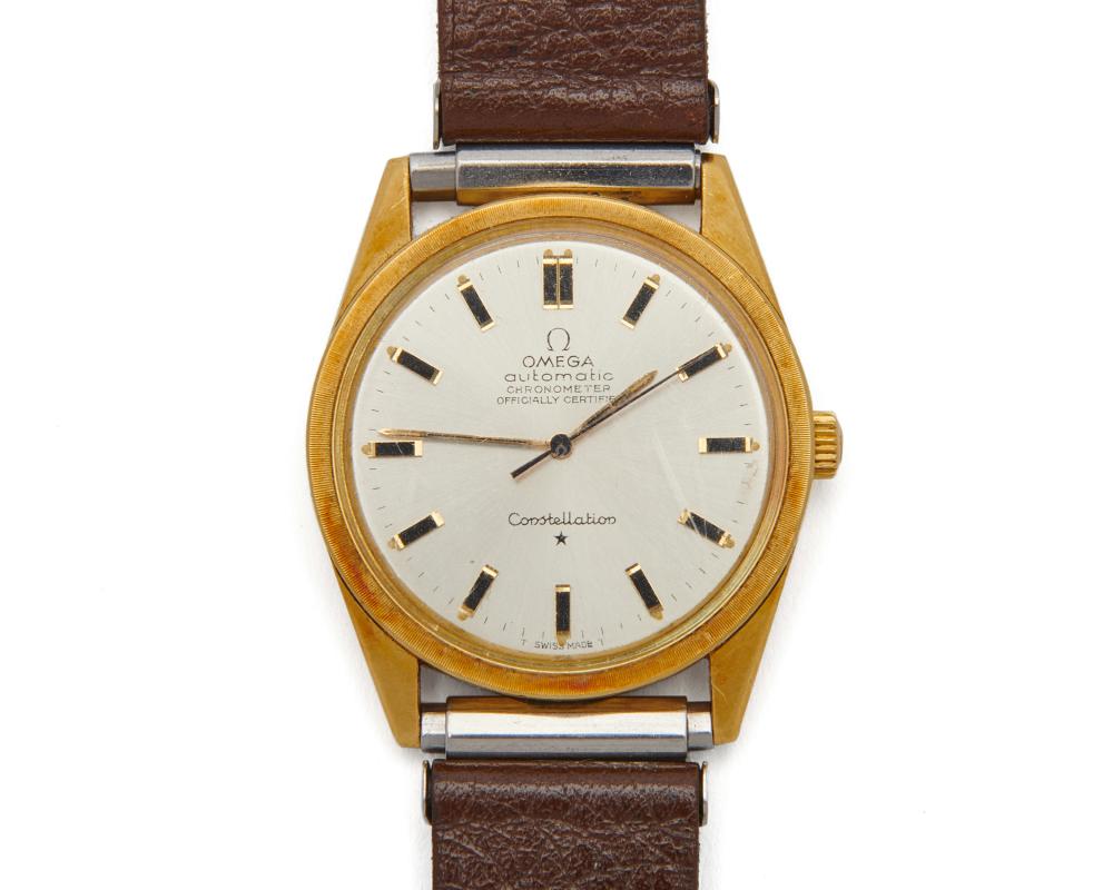 Appraisal: OMEGA K Gold Constellation Wristwatch ca the silvered dial with