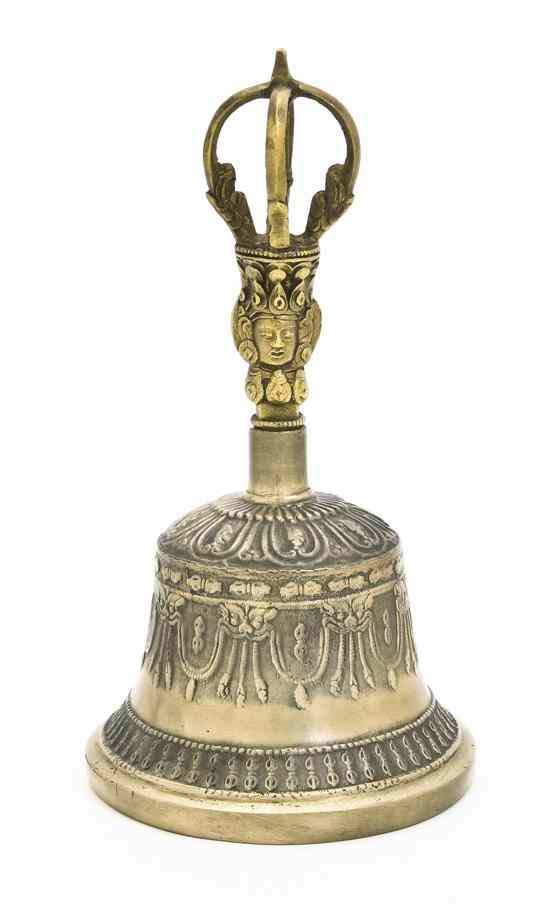 Appraisal: A Tibetan Cast Metal Bell the bell decorated with beaded