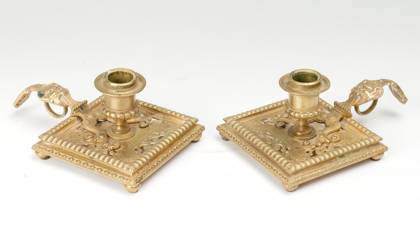 Appraisal: PAIR OF GILT BRONZE CHAMBERSTICKS Gilt bronze chambersticks having a