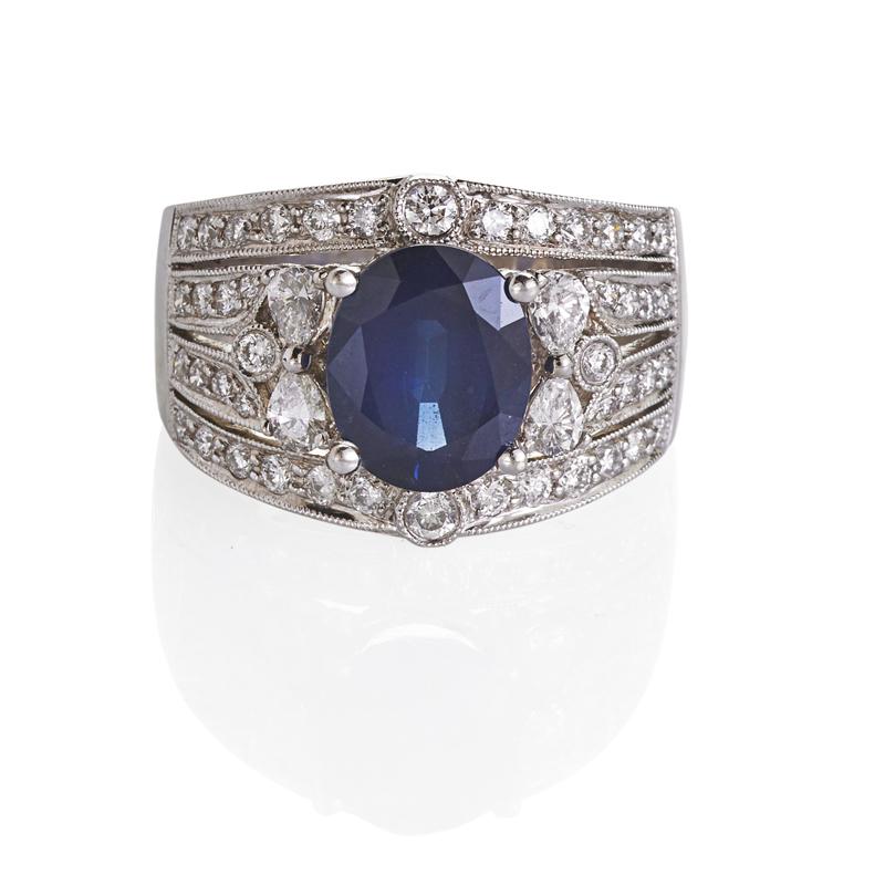 Appraisal: SAPPHIRE AND DIAMOND K WHITE GOLD RING Condition Report Sapphire