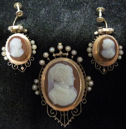 Appraisal: Cameo brooch and earring setRose gold setting cameos framed by