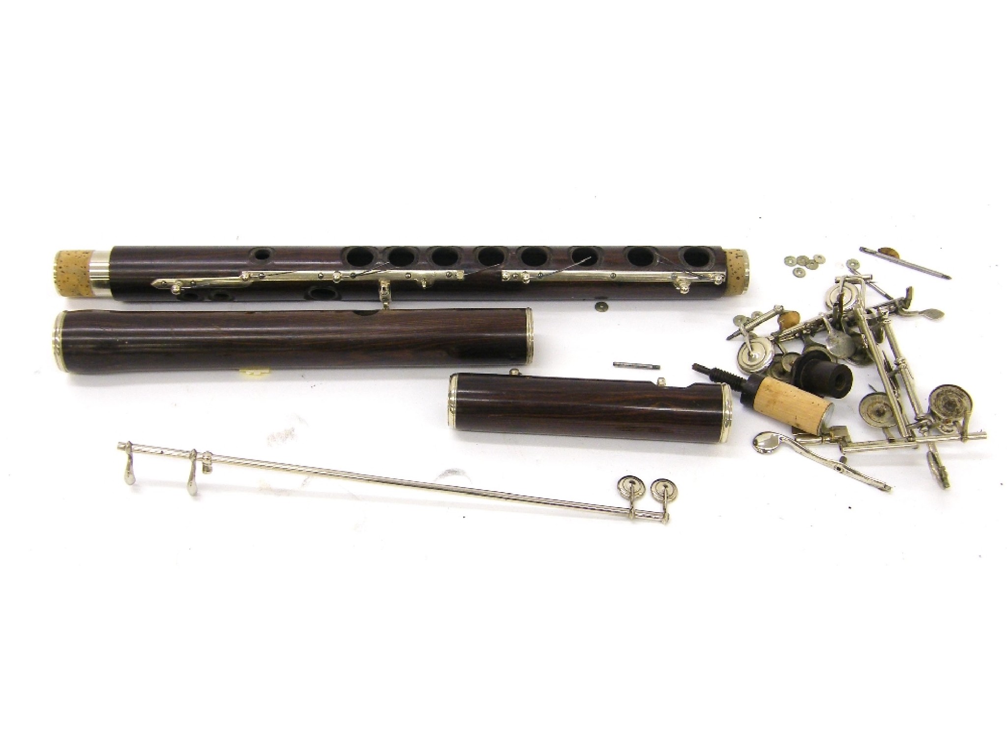 Appraisal: French rosewood Boehm system flute in need of assembly with