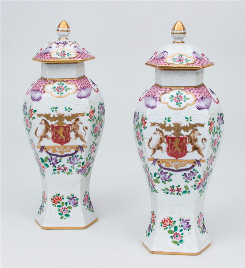 Appraisal: PAIR OF CHINESE EXPORT STYLE PORCELAIN ARMORIAL VASES AND COVERS