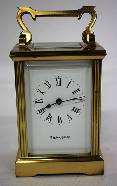 Appraisal: A SMALL LACQUERED BRASS CARRIAGE TIMEPIECE the dial with Roman