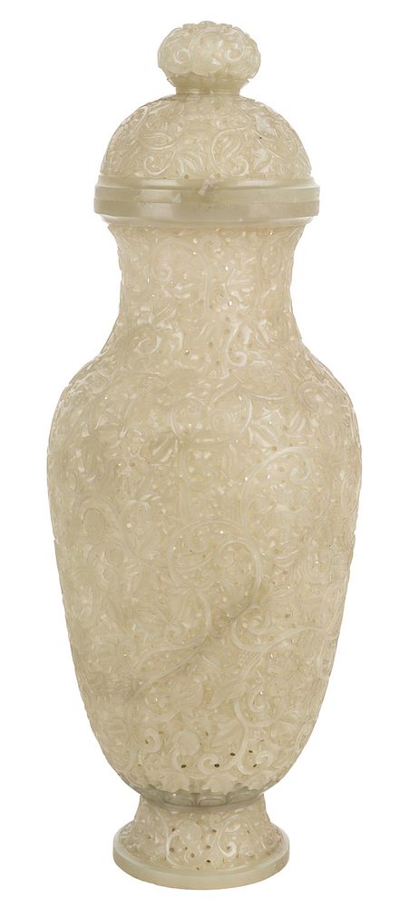 Appraisal: A CHINESE PIERCED WHITE-GREEN JADE VASE AND COVER TH CENTURY