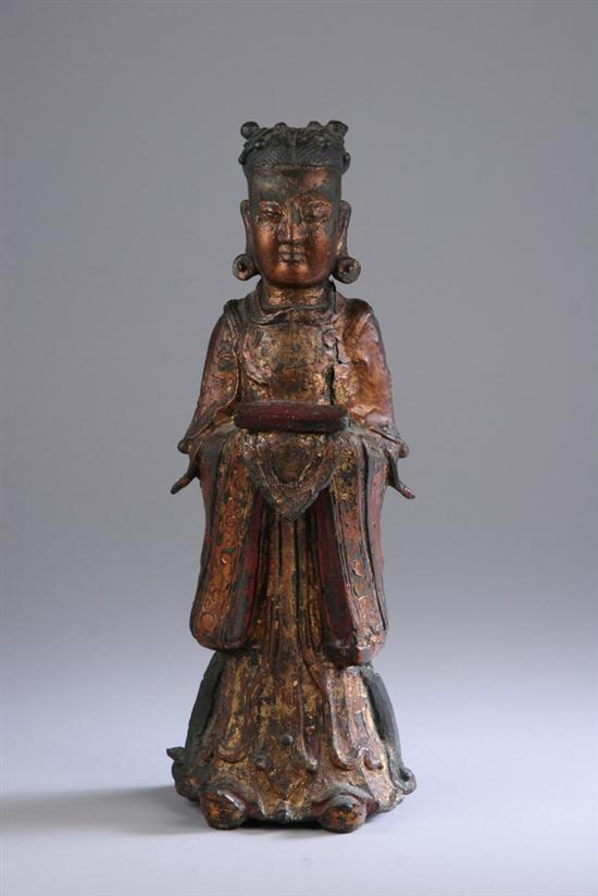 Appraisal: CHINESE RED LACQUERED BRONZE FIGURE OF FEMALE ATTENDANT Ming Dynasty