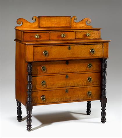 Appraisal: Classical cherry and figured maple chest of drawers circa Scrolled