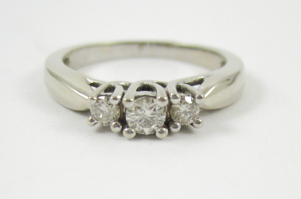 Appraisal: THREE STONE DIAMOND AND WHITE GOLD RING The k white