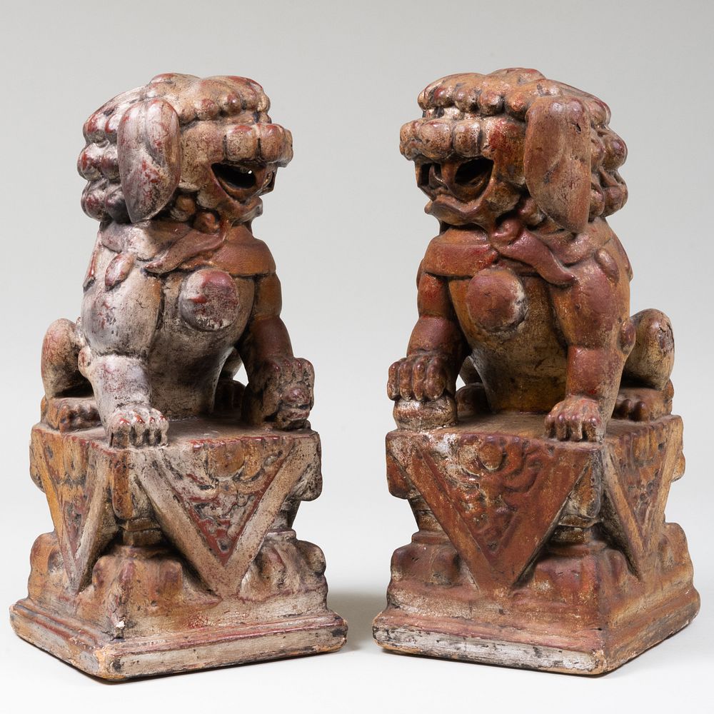 Appraisal: Pair of Chinese Polychromed and Parcel-Gilt Models of Buddhistic Lions