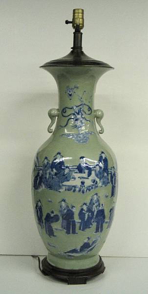 Appraisal: A celadon glazed porcelain vase Of baluster shape with two