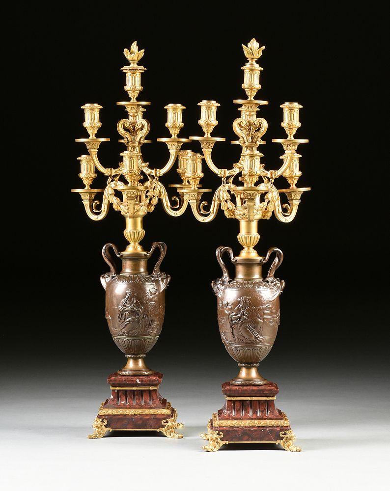 Appraisal: A PAIR OF FRENCH NEOCLASSICAL STYLE GILT AND PATINATED BRONZE