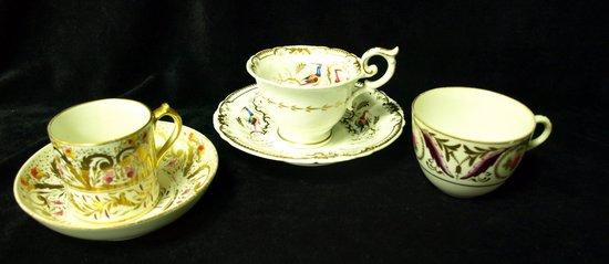 Appraisal: A Davenport teacup and saucer decorated birds and butterflies and