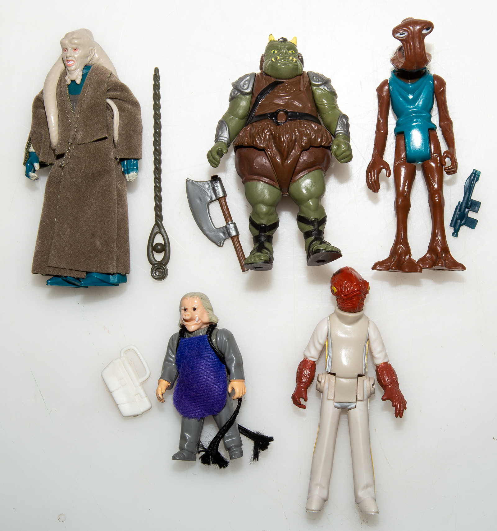 Appraisal: FIVE KENNER STAR WARS FIGURES Includes Ugnaught Bib Fortuna Gamorrean