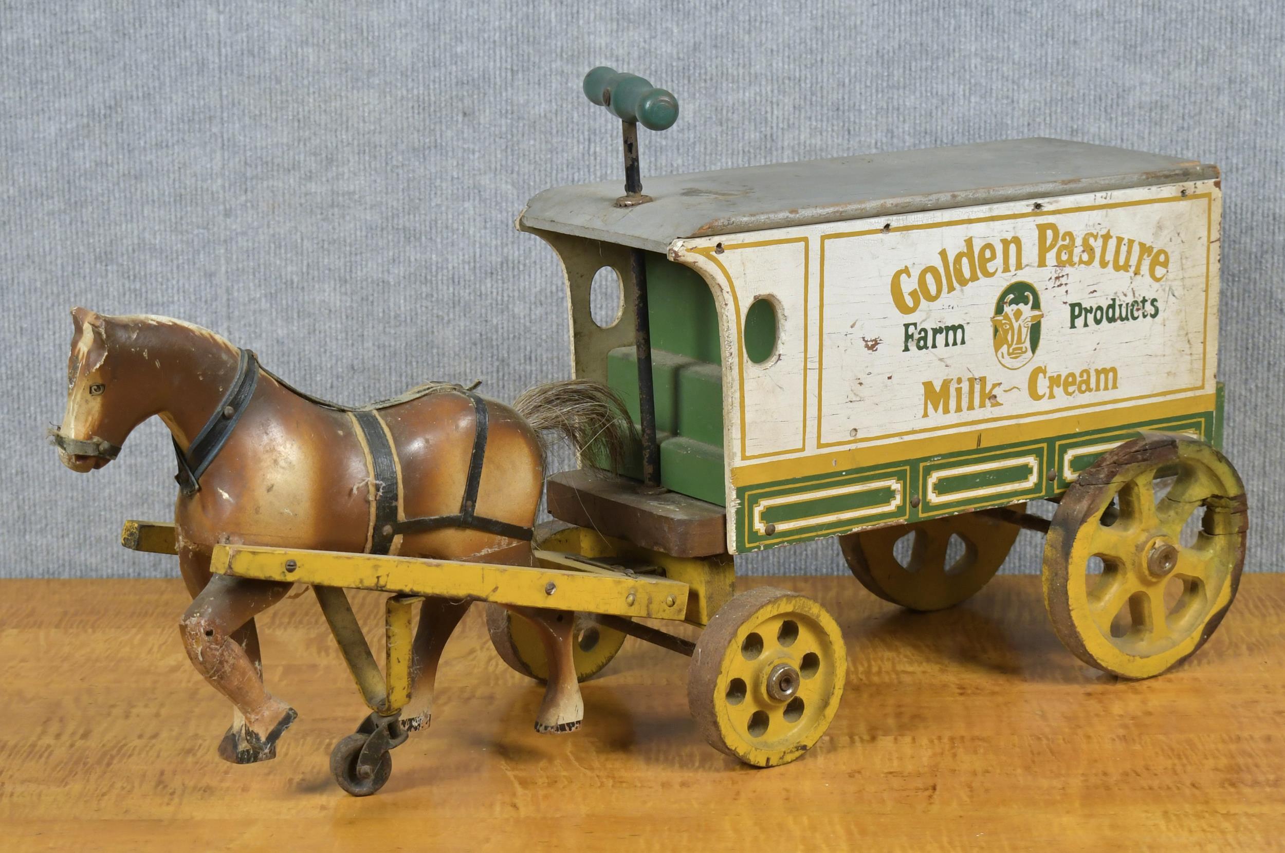 Appraisal: ANTIQUE CHILD S HORSE DRAWN RIDE-ON TOY Ca s paint