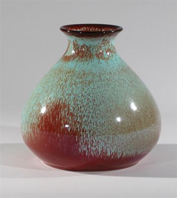 Appraisal: An Ashworth Pottery vase swollen ovoid form with flaring rim