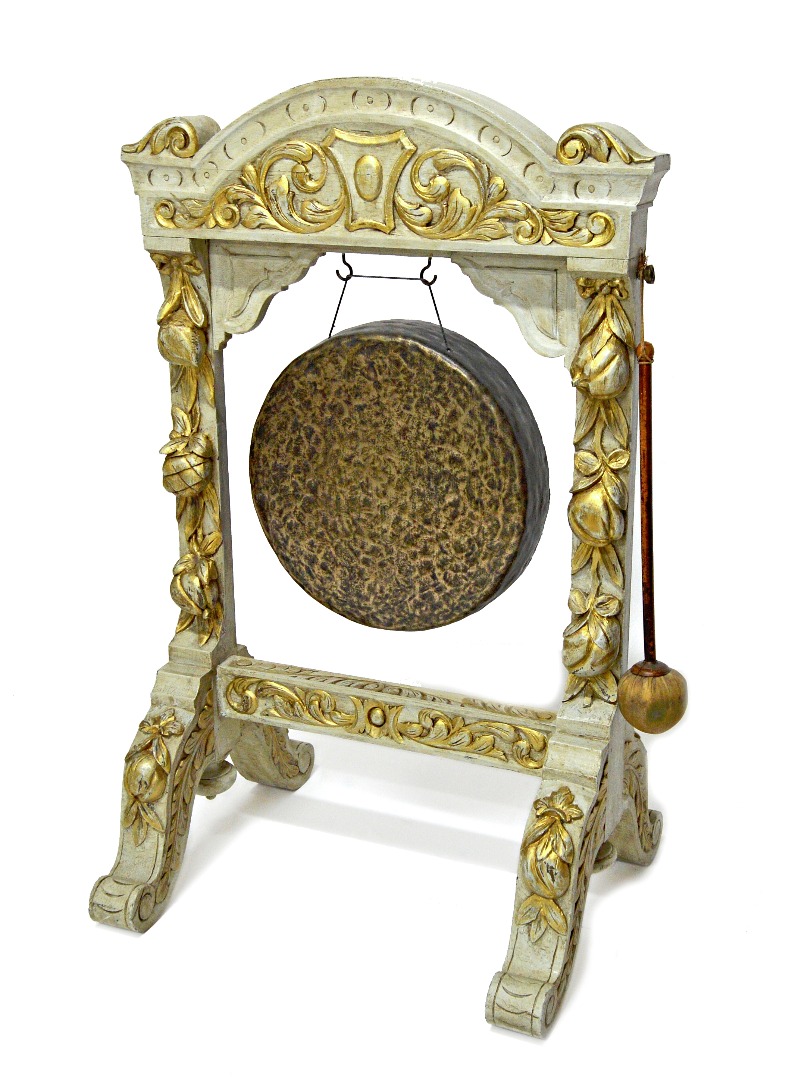 Appraisal: A late Victorian dinner gong in a carved gilt highlighted