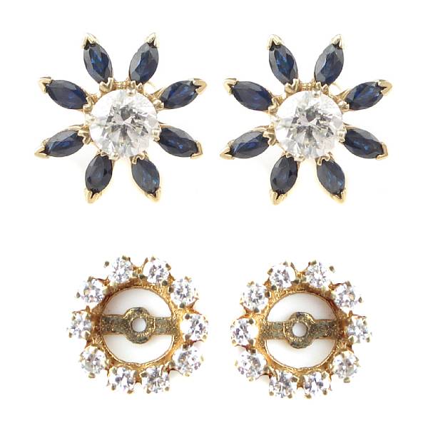 Appraisal: A pair of diamond stud earrings with diamond jackets and