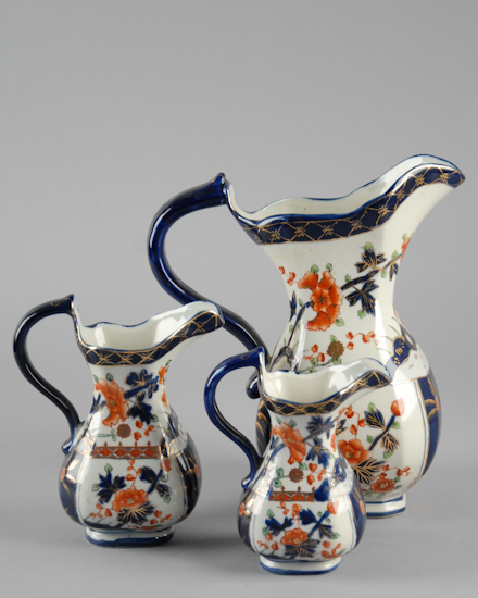 Appraisal: Set of Three English Ironstone Pitchers decorated in the manner