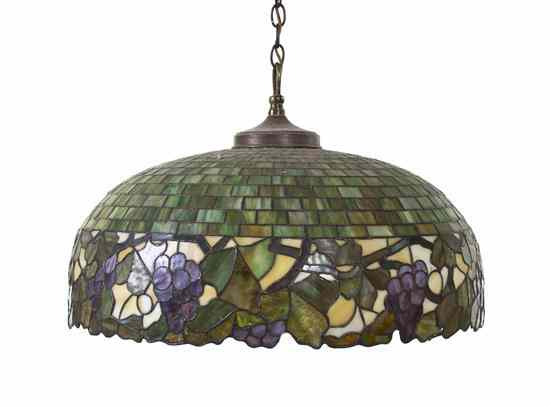 Appraisal: An American Leaded Glass Fixture the geometric domed shade having