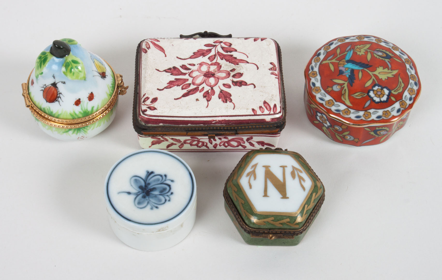 Appraisal: Five assorted Faience snuff boxes th th century gilt-metal-mounted Faience