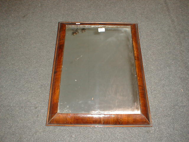 Appraisal: An thC walnut cushion frame with rectangular mirror plate x