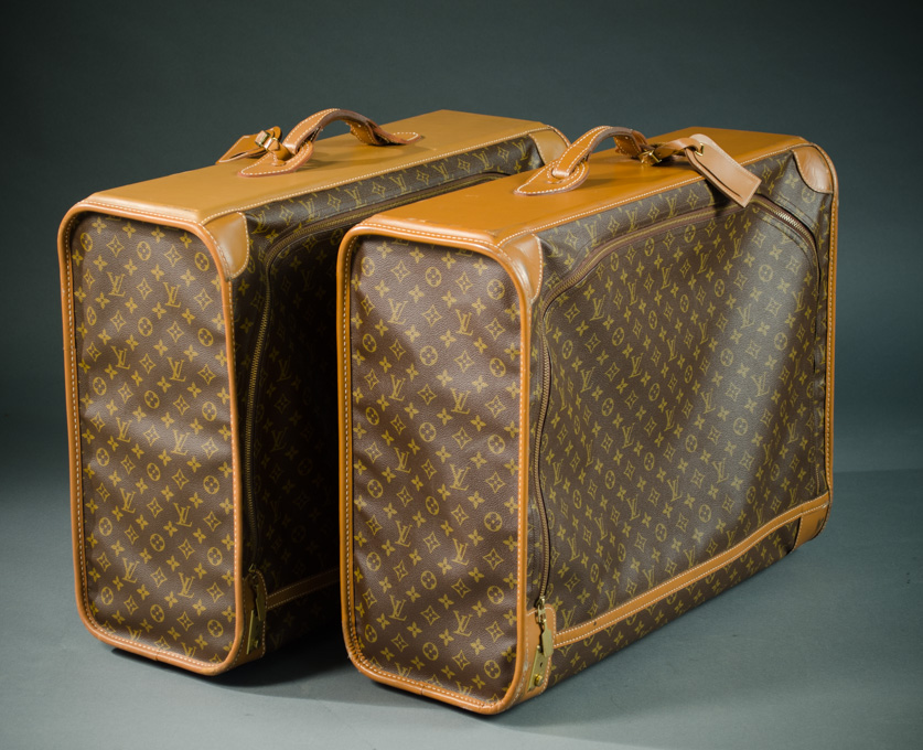 Appraisal: A PAIR OF LOUIS VUITTON SOFT-SIDED SUITCASES s monogrammed leather