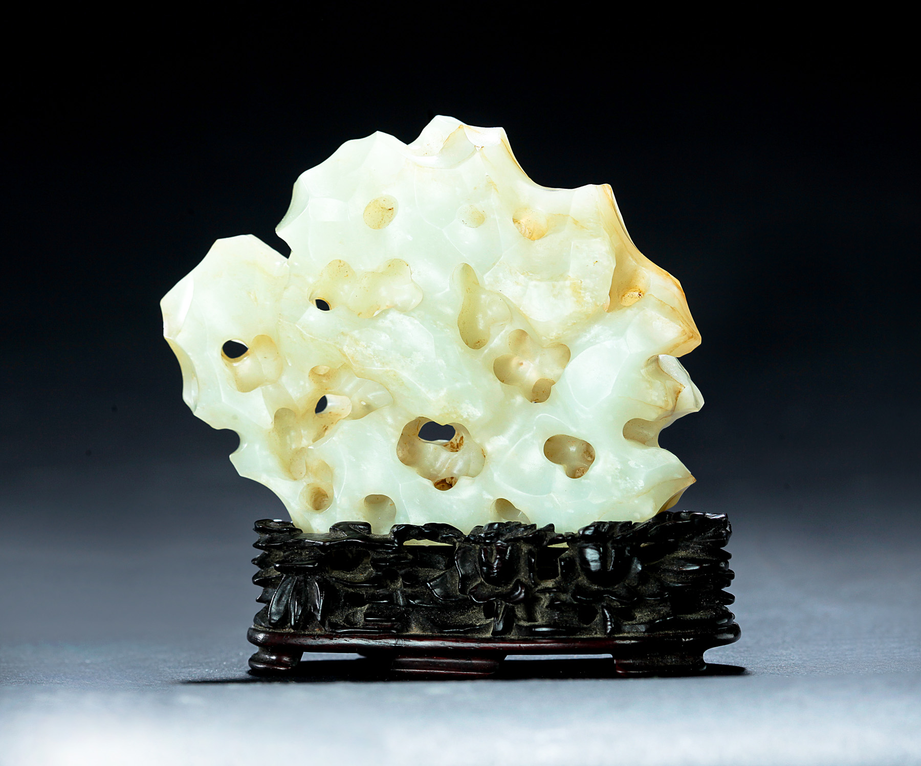 Appraisal: CHINESE SCHOLAR OBJECT OF A JADE MOUNTAIN Eighteenth century Openwork