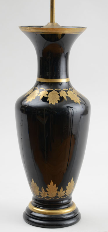 Appraisal: FRENCH BLACK-GLASS BALUSTER-FORM VASE MOUNTED AS A LAMP With gilt-leaf