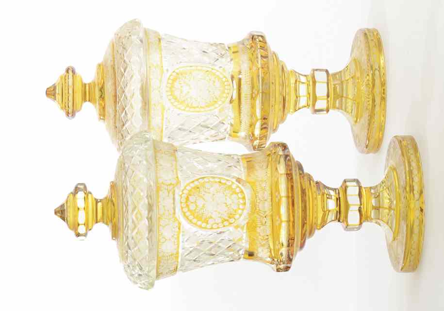 Appraisal: PAIR BOHEMIAN HAND CUT AND ENGRAVED CRYSTAL COVERED JARS The