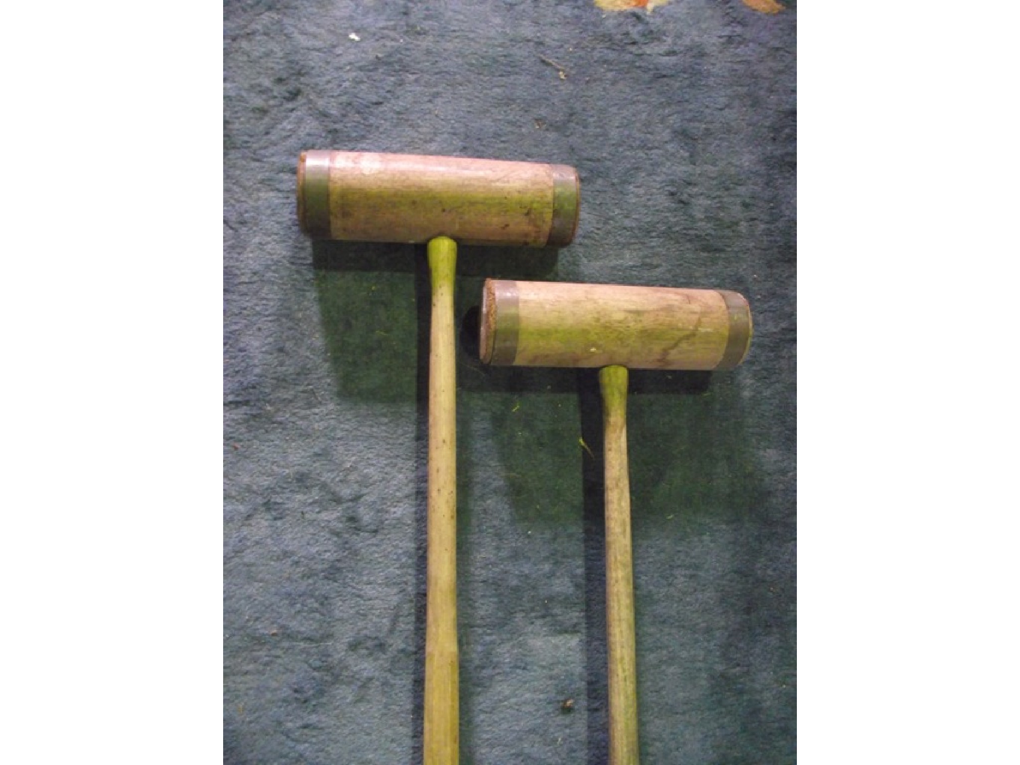 Appraisal: Two vintage wooden croquet mallets with brass rings