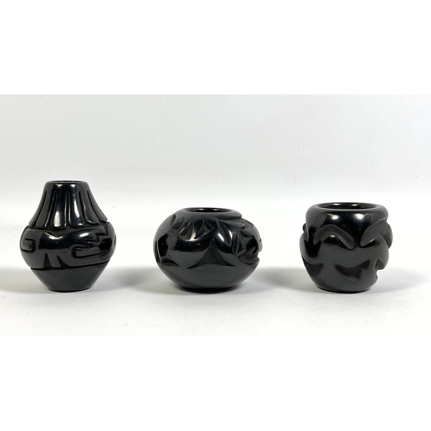 Appraisal: pcs DSanta Clara Pottery Carved Black Dimensions H inches --