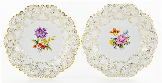 Appraisal: Pair gilded Meissen porcelain cabinet plates shaped rim over relief-molded