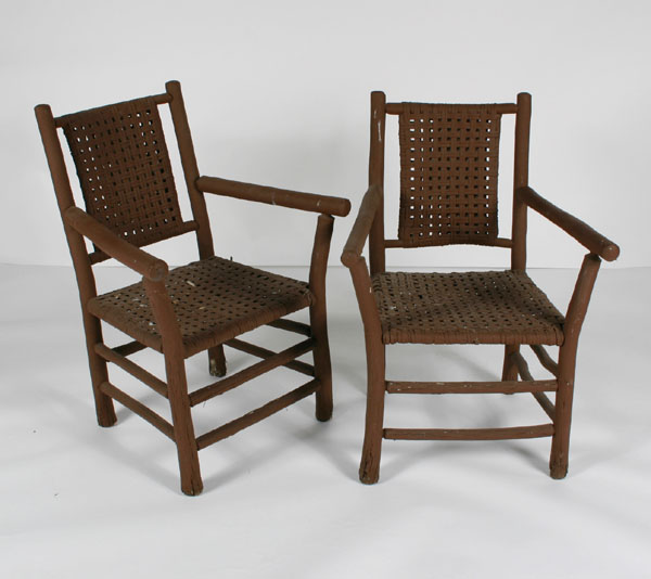 Appraisal: Pair old hickory arm chairs with woven rush seats and