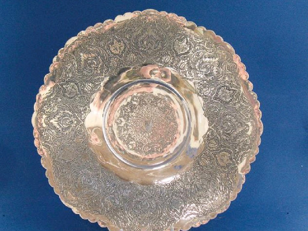 Appraisal: A PERSIAN SILVER COLOURED METAL DISH with engraved decoration of