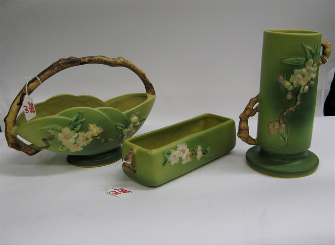 Appraisal: THREE PIECES ROSEVILLE POTTERY in the Apple Blossom pattern basket